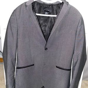 Grey suit jacket lightly worn